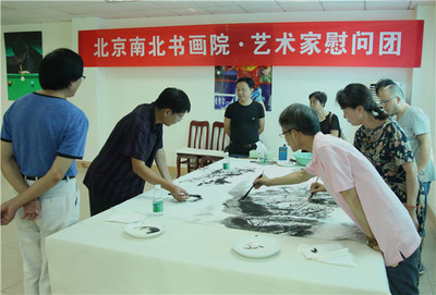 翰墨传情暖警营 艺术交流励红妆——北京南北书画院艺术家赴四川女子特警队开展慰问交流活动